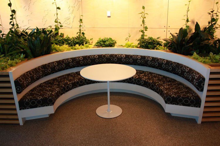 small solid surface table in booth