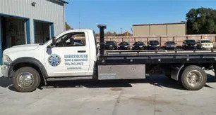 Lighthouse tow and recovery service truck — Lawrence, KS — Lighthouse Tow & Recovery Lighthouse tow and recovery service truck — Lawrence, KS — Lighthouse Tow & Recovery