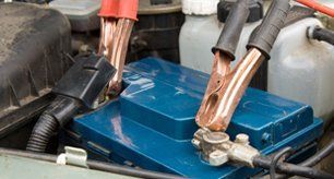 Car engine jump start — Lawrence, KS — Lighthouse Tow & Recovery Car engine jump start — Lawrence, KS — Lighthouse Tow & Recovery