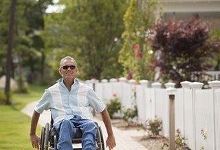 Man in a Wheelchair — Law Firm in Garland, TX Man in a Wheelchair — Law Firm in Garland, TX