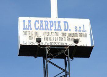 insegna La Carpia