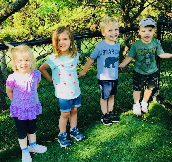 Four Kids Playing Outside — Omaha, NE — Montessori Academy Of West Omaha