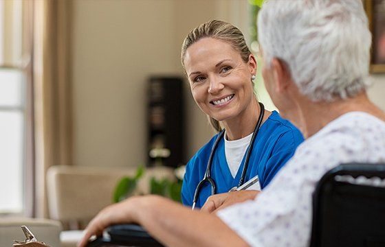 Doctor Examining Health of Patient — Kenosha, WI — Home Care Services
