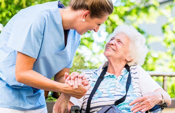 Nurse Holding Hand of Senior Woman — Kenosha, WI — Home Care Services Nurse Holding Hand of Senior Woman — Kenosha, WI — Home Care Services