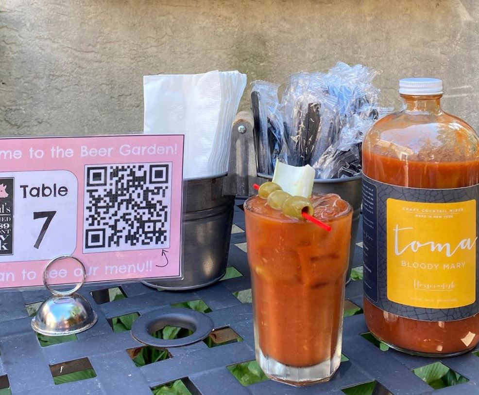 image of a Bloody Mary on a patio table