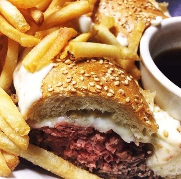 French dip sandwich with fries and au jus