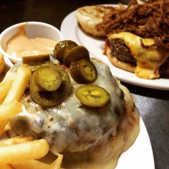 cheeseburger with jalapenos on top