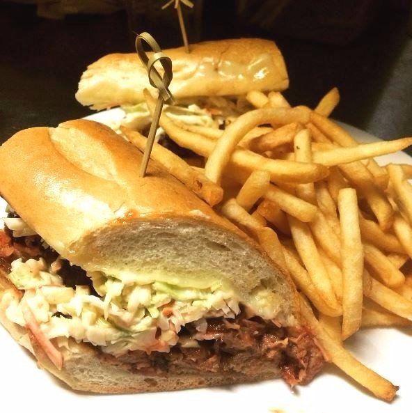 pulled pork sandwich with fries