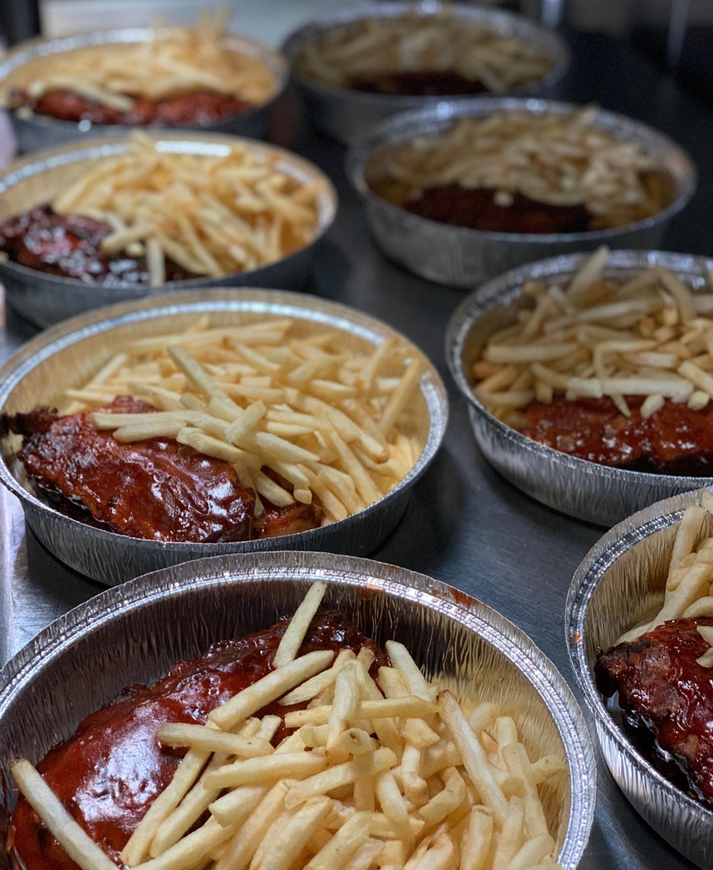 ribs and fries to-go order in tins