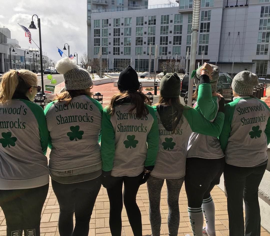 Sherwood's staff wearing jerseys that say Sherwood's Shamrocks