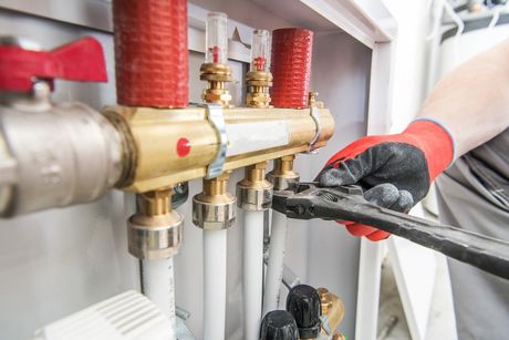 Repairing Using Wrench — Midland, TX — Randy's Rooter & Plumbing LLC Repairing Using Wrench — Midland, TX — Randy's Rooter & Plumbing LLC