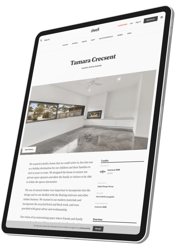 Tablet displaying a minimalist real-estate webpage for a bright, empty interior