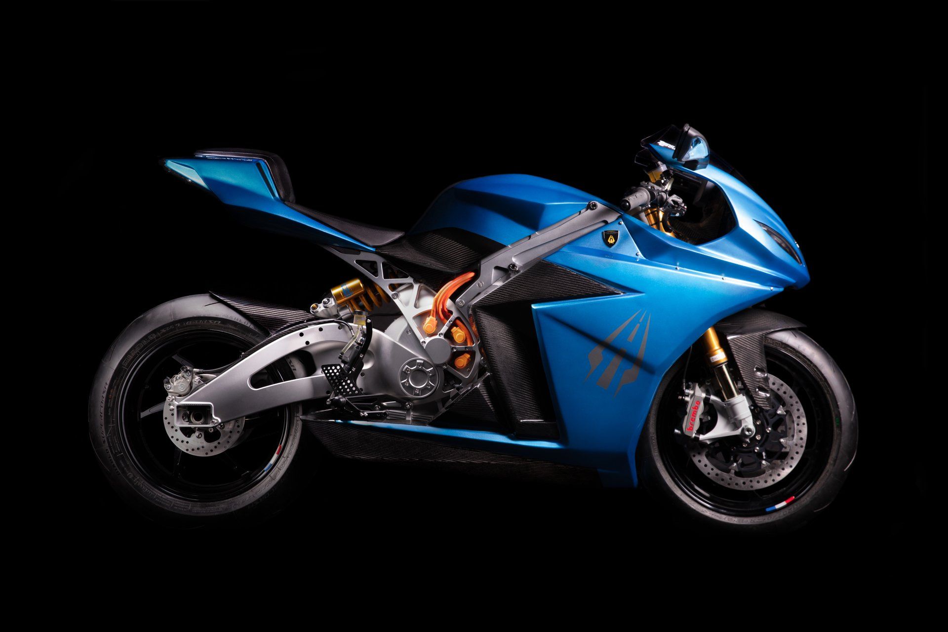 Blue electric motorcycle on a black background.