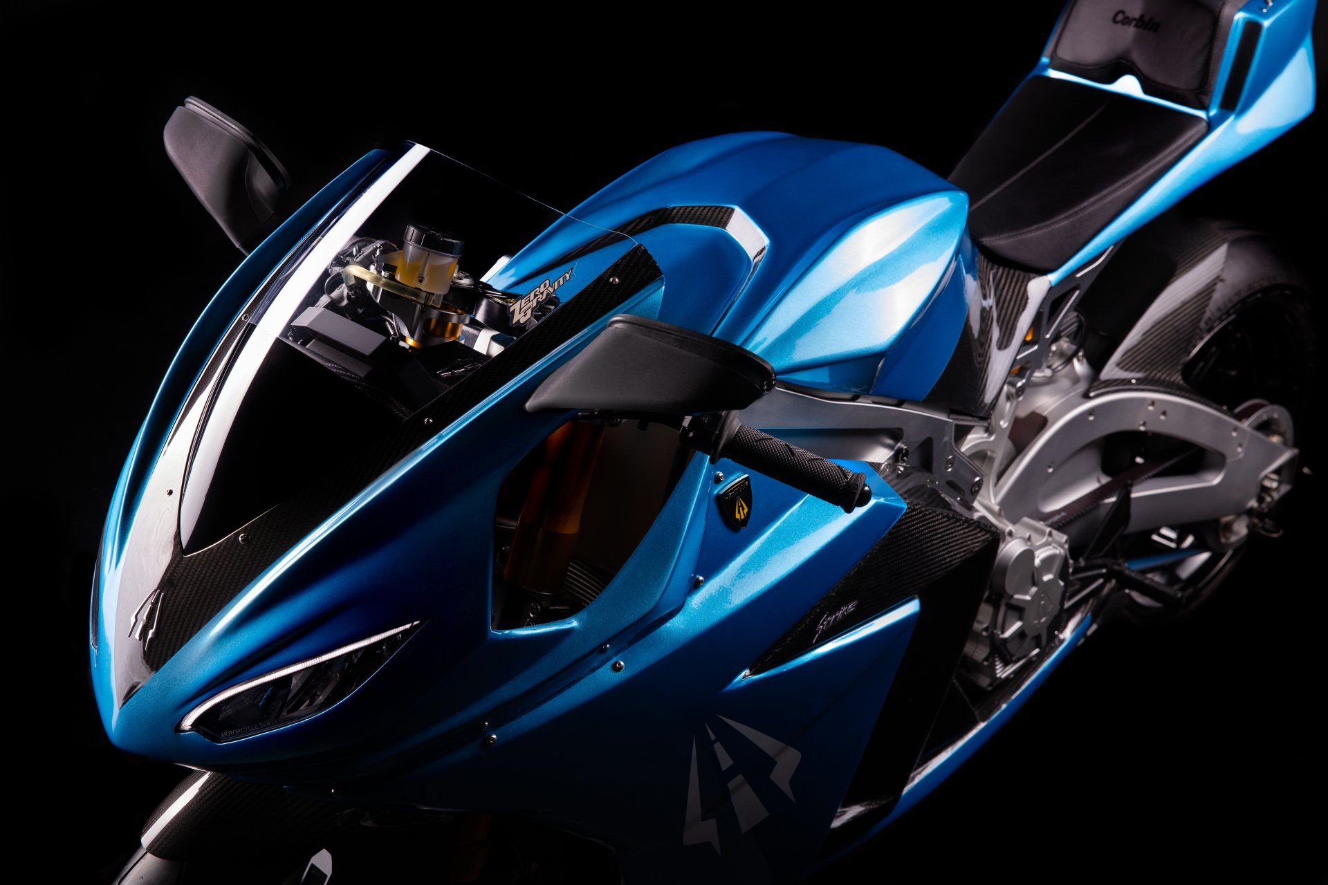 Blue sport motorcycle on a black background.