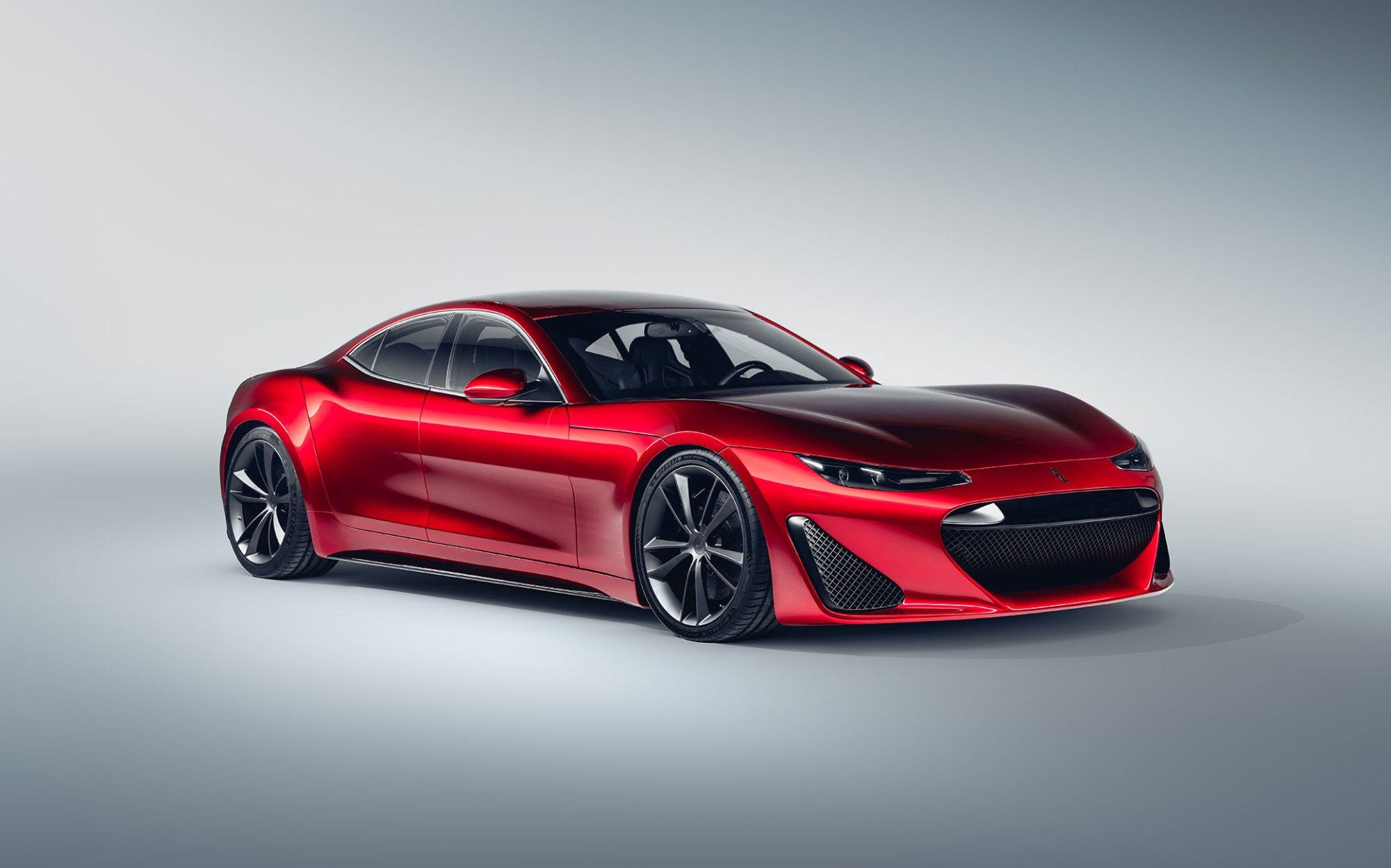 Red sports car on a white background.