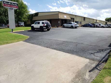 Collision Repair — Auto Workshop Mechanic Inspecting Car in Tulsa, OK Collision Repair — Auto Workshop Mechanic Inspecting Car in Tulsa, OK