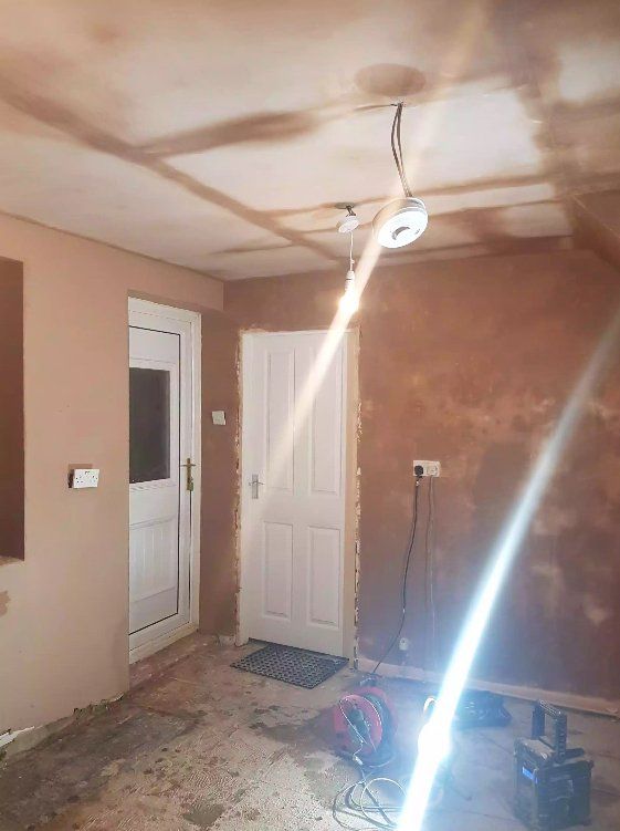 Fresh plaster drying on room walls and ceiling in York