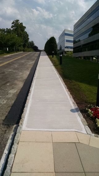 Re-surfaced Sidewalk - Commercial Hardscaping in Bedford Hills, NY Re-surfaced Sidewalk - Commercial Hardscaping in Bedford Hills, NY