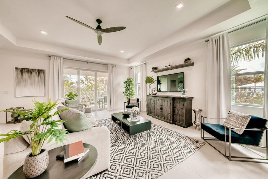 Caitlin Russell is a realtor who sells and buys homes in Palm Beach County and Martin County
