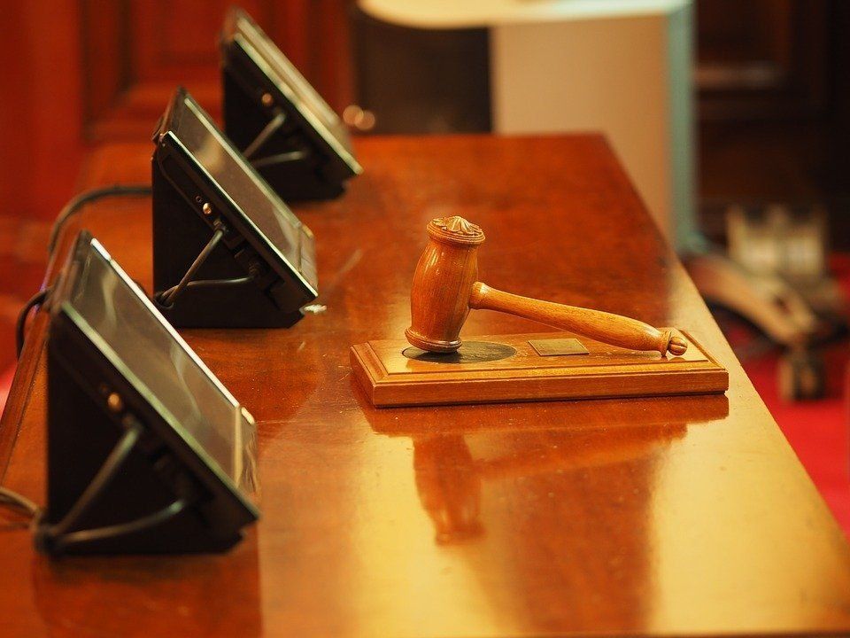 A court of law with hammer and anvil