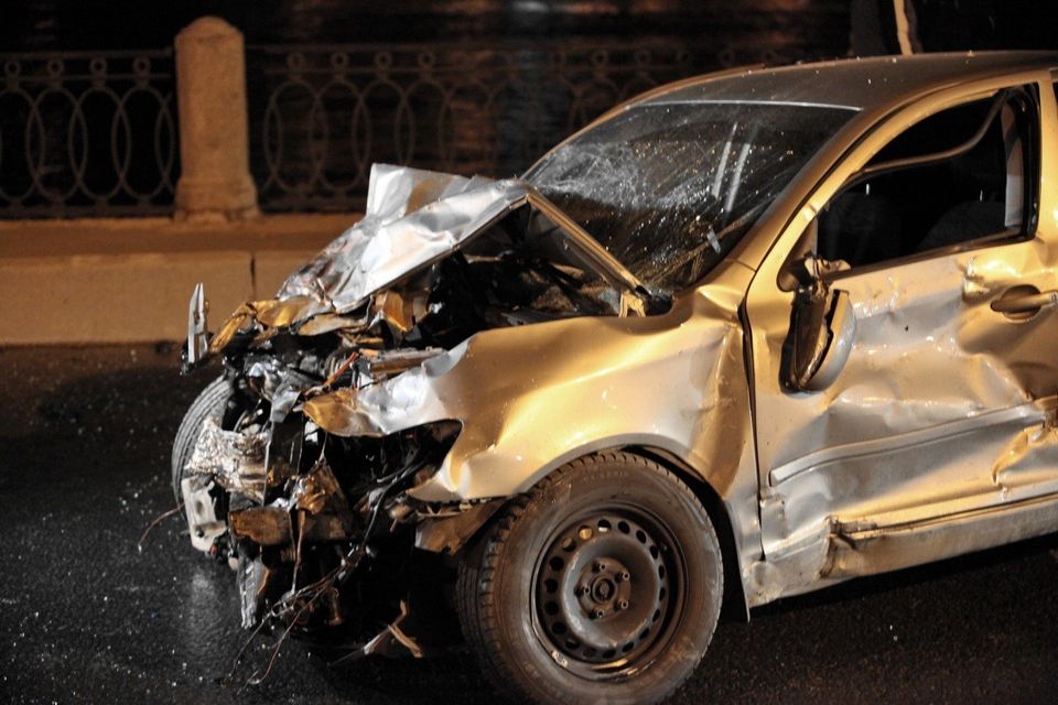 A heavily damaged car after an accident.