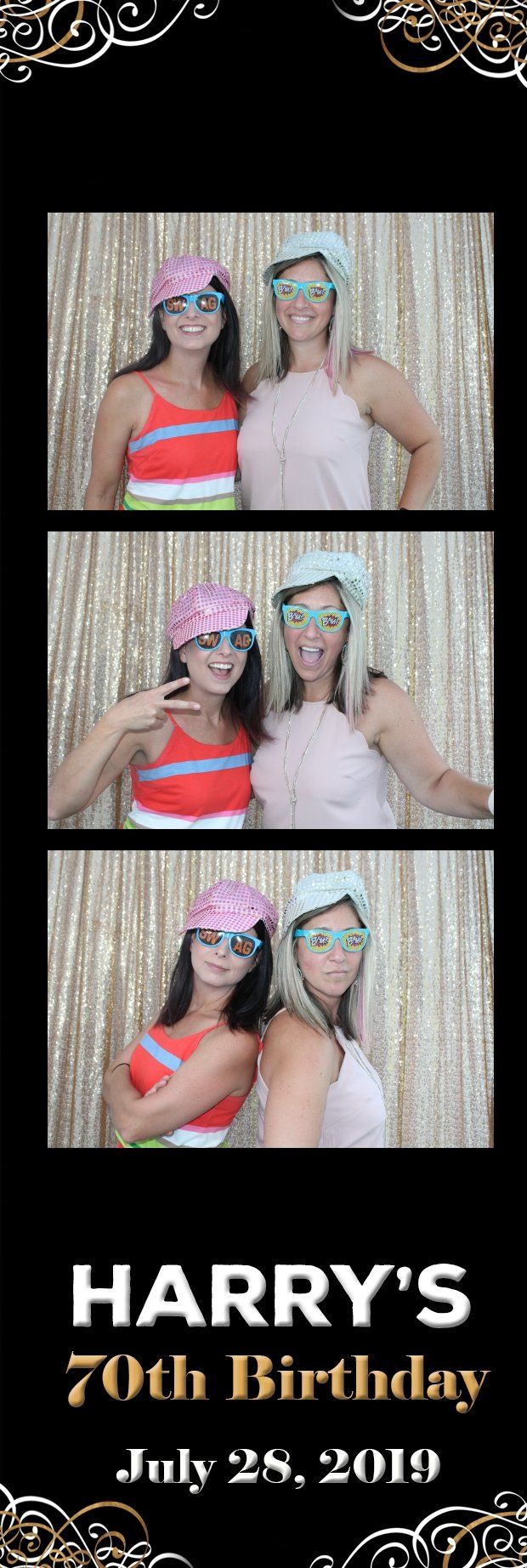 Photo booth strip for Harry's 70th Birthday, July 28, 2019. Two women pose with hats and glasses in front of a gold curtain.