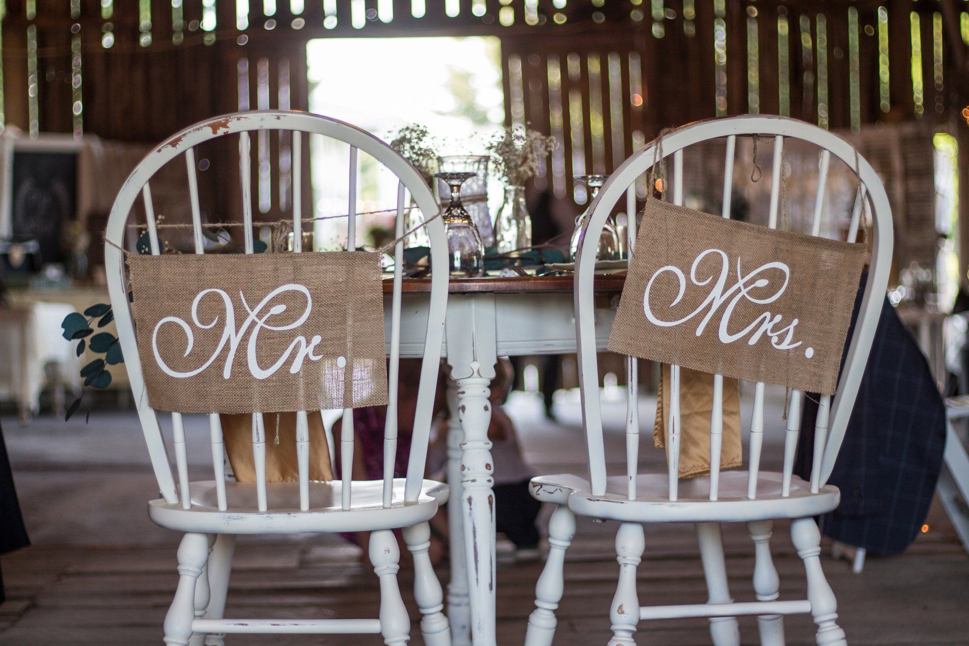 Two white chairs with 