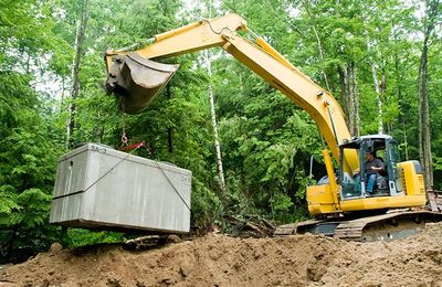 Installing Septic Tank With Excavator — Lower Lake, CA — Lake County Pumpers