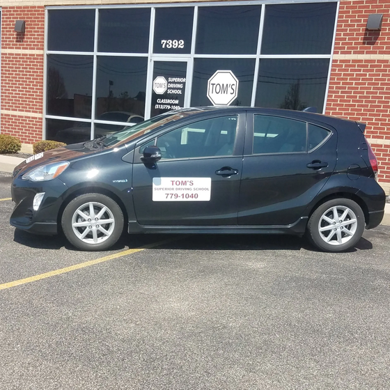Black driving school car
