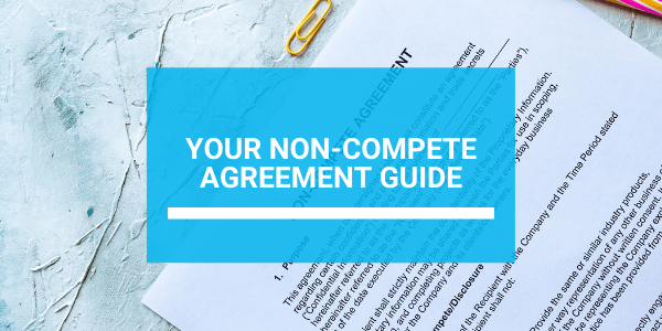 A non compete agreement guide is sitting on top of a piece of paper.