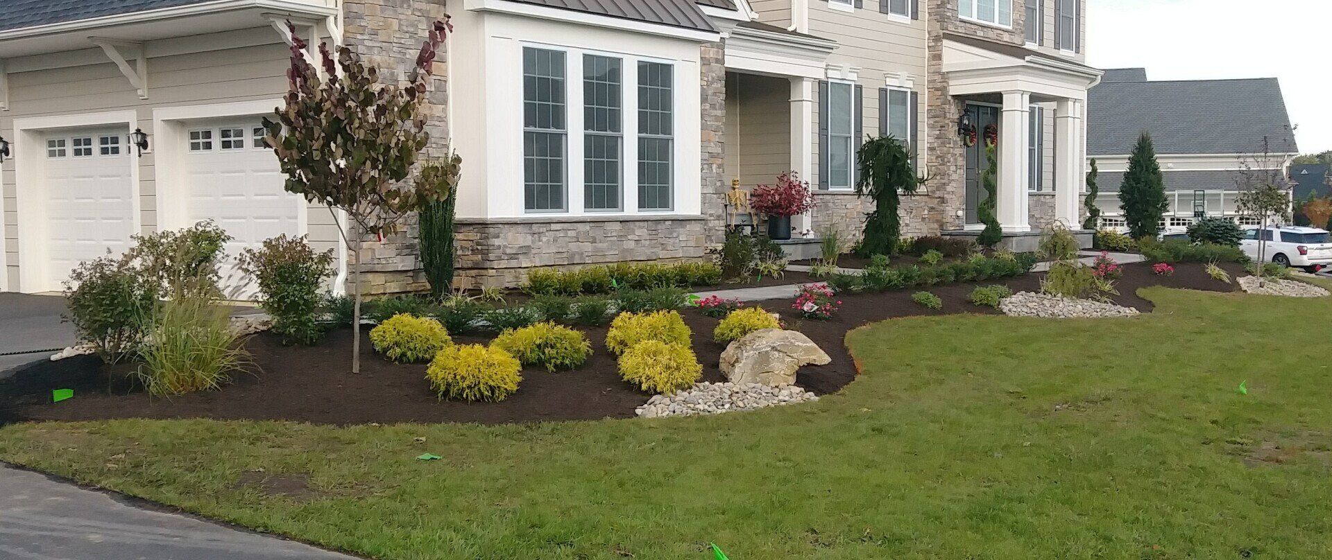 Gardener Installing Natural Grass Turfs Creating Beautiful Lawn Field.