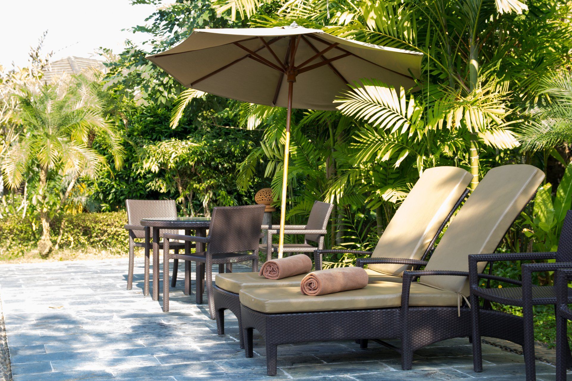 Well Landscaped Pool Area and Relaxing seats