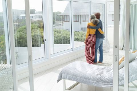 Couple Looking Outside the Window — Pasadena, CA — Cliffs Discount Glass Couple Looking Outside the Window — Pasadena, CA — Cliffs Discount Glass