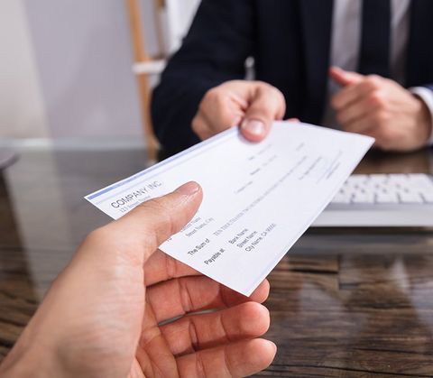 Payroll — Businessperson Giving Cheque in Winchester, KY Payroll — Businessperson Giving Cheque in Winchester, KY