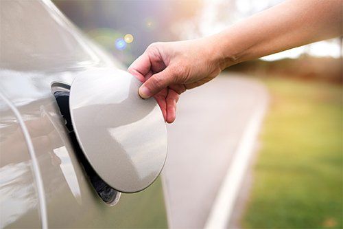 A Person Opening Fuel Cap