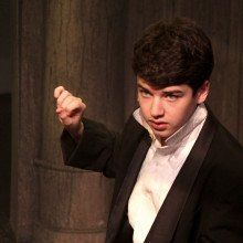 Student actor performing in Les Misérables