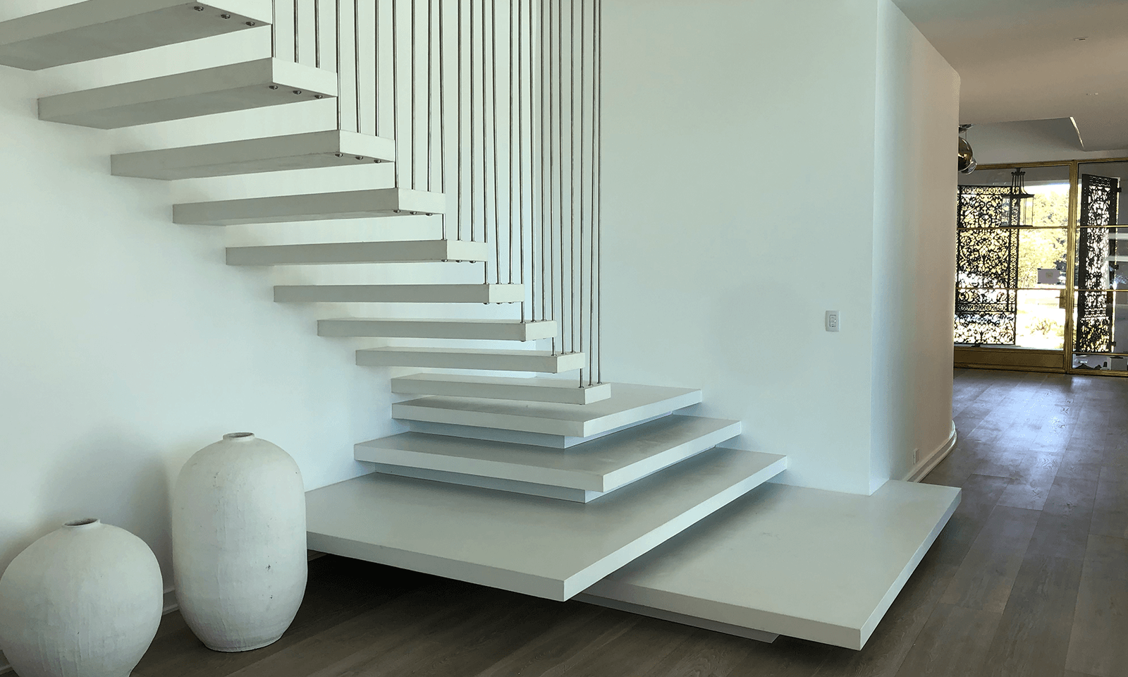 concrete floating staircase, Charlotte, North Carolina white concrete stair concrete artisan