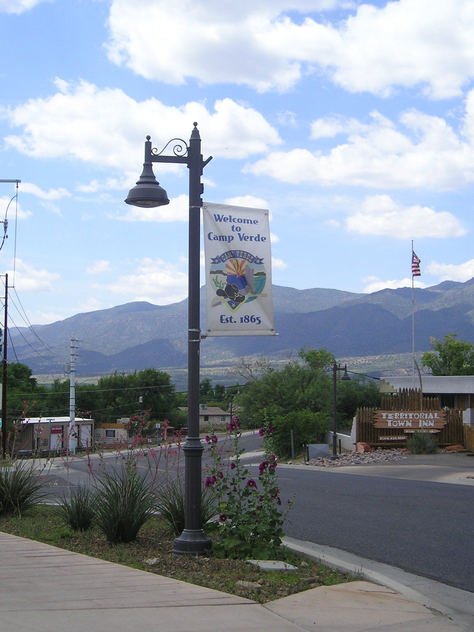 A street light with a sign that says 