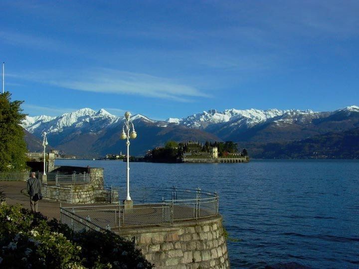A large body of water with mountains in the background