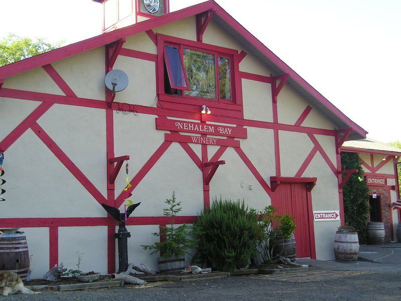 A red and white building with a sign that says ' bakery ' on it