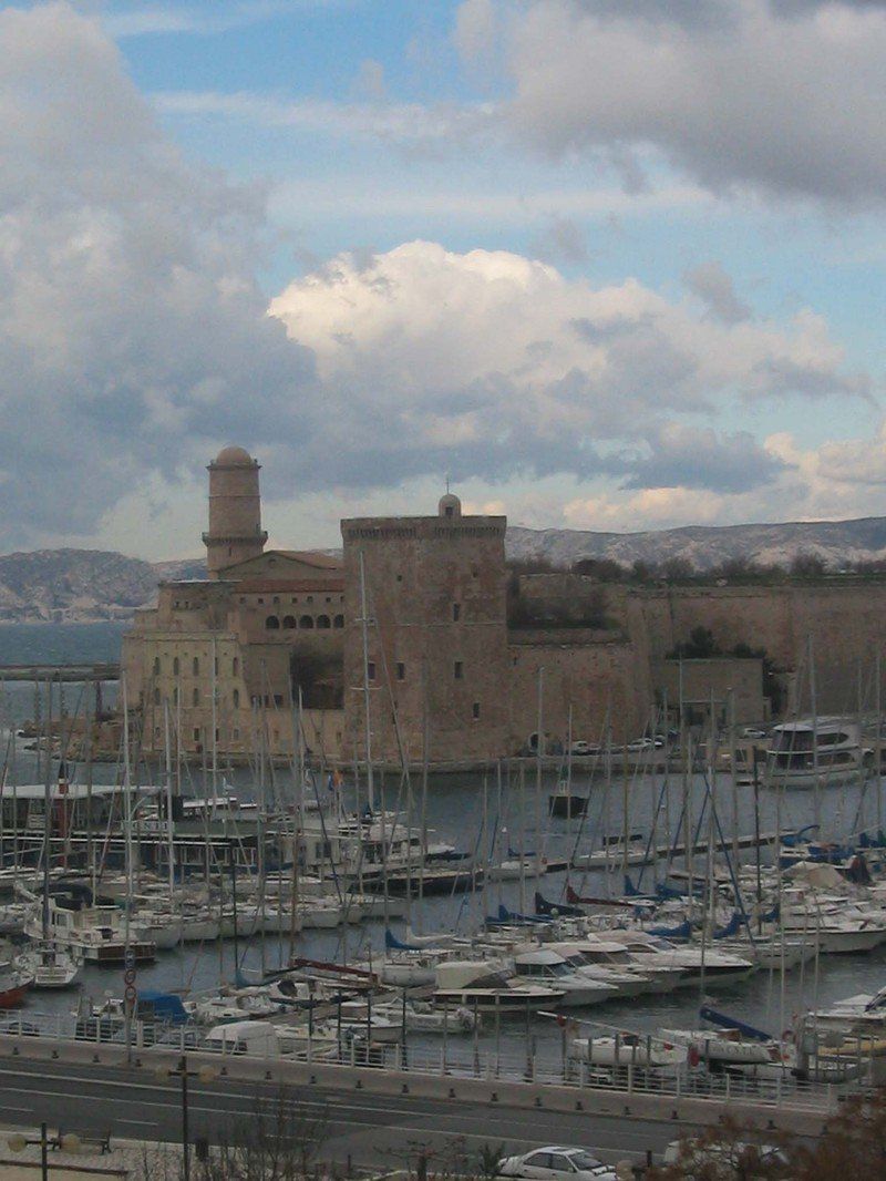 A city with a lot of boats docked in the water