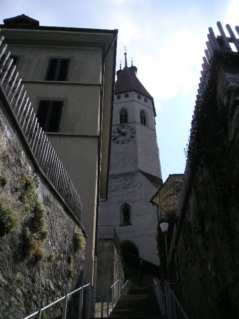 A building with a clock on the top of it