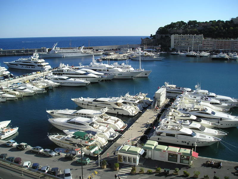 A large number of boats are docked in a harbor