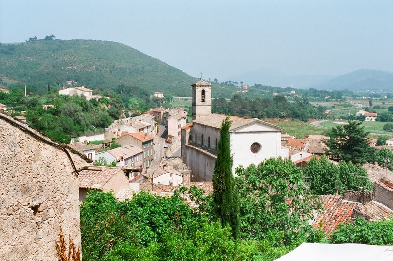 A small village with a church in the middle of it
