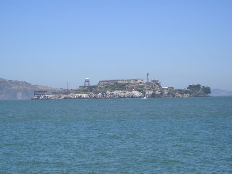 A large island in the middle of a body of water.