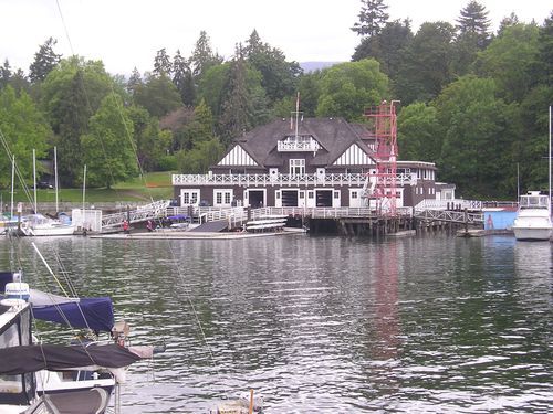 A large house sits in the middle of a body of water