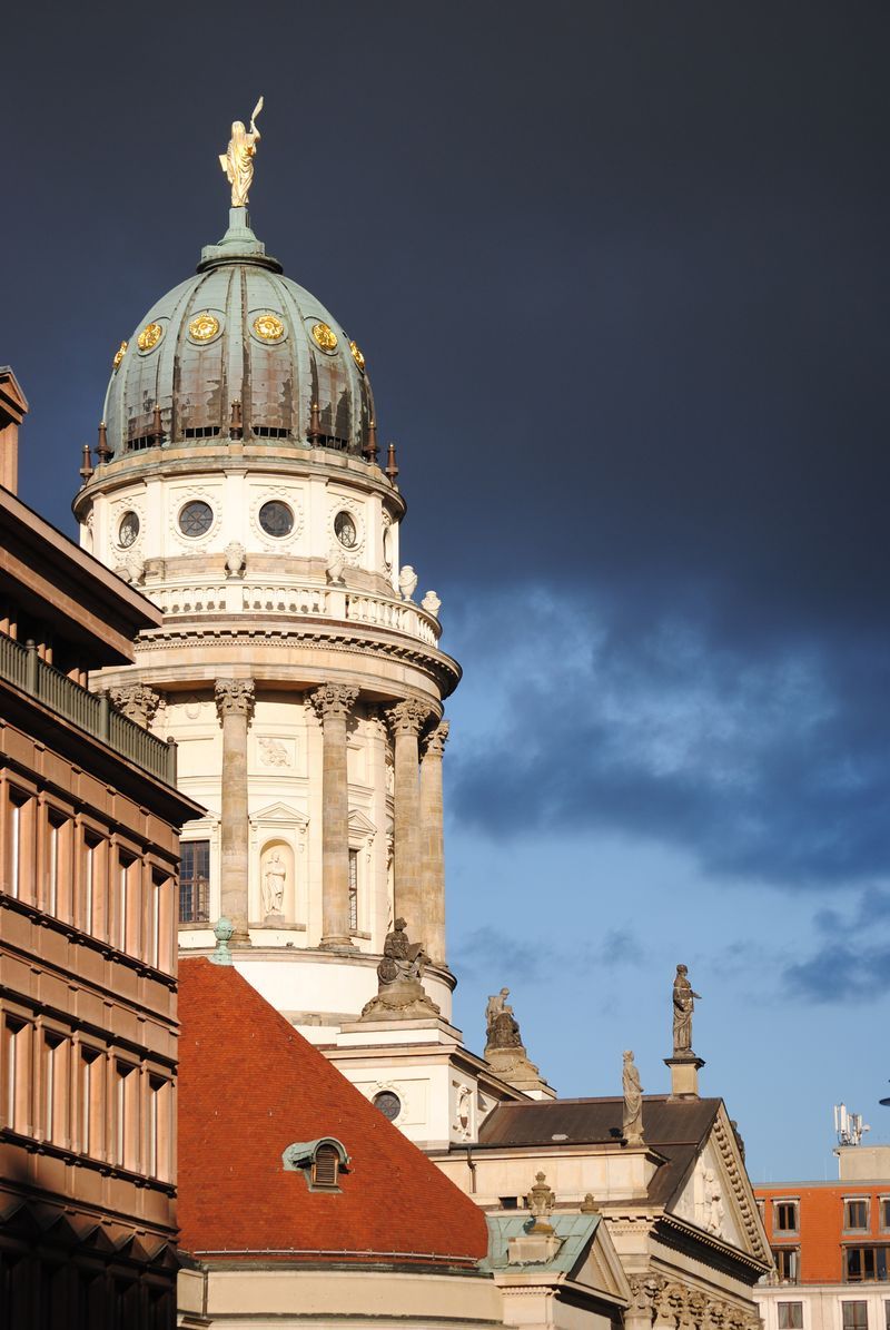 A very tall building with a dome on top of it