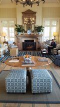 A living room filled with furniture and a fireplace.