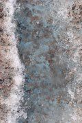 A close up of a concrete surface with a white line on it.