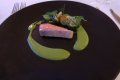 A close up of a plate of food on a table.